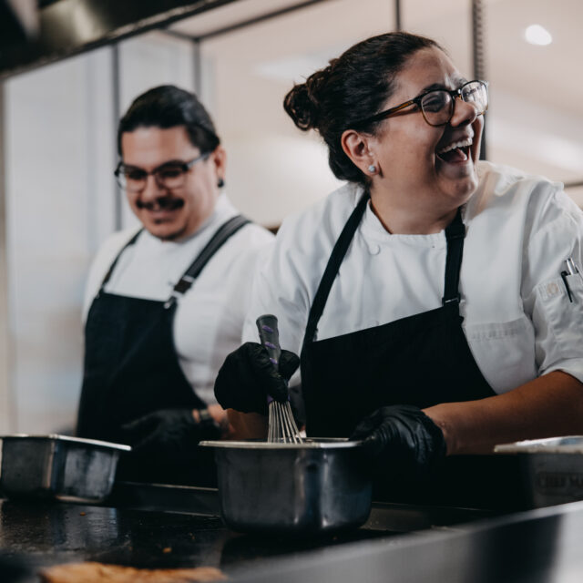 Two employees working in the kitchen